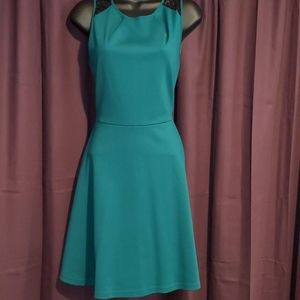 Emerald cocktail dress with lace detail